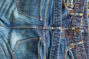 Image showing fashion jeans in stack