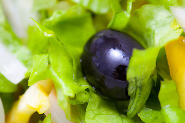 Image showing black olives and lettuce