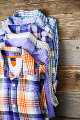 Image showing bright shirts in a pile