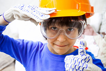 Image showing boy in the orange helmet