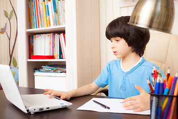 Image showing schoolboy doing homework