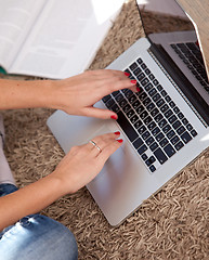 Image showing Female hands on a keyboard