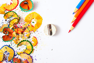 Image showing varicolored pencil, shavings and sharpener