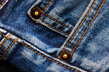 Image showing part of old blue jeans