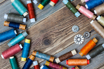 Image showing vintage reels of assorted thread and old buttons