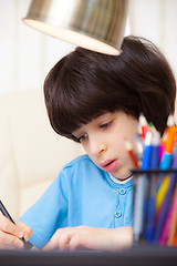 Image showing Boy doing homework, portrait