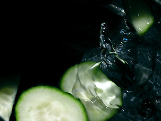 Image showing cucumber slices in water