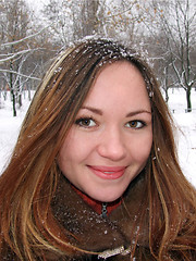 Image showing Portrait of the beautiful girl in the winter in park