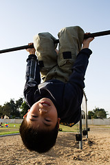 Image showing Unside down kid