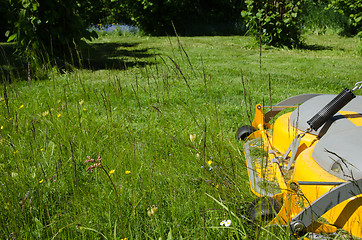 Image showing Lawncare with a riding mower