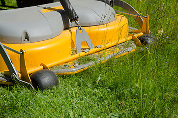 Image showing Detail of a riding lawn-mower