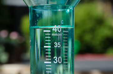 Image showing Filled rain gauge