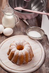 Image showing Marble cake with baking utensils