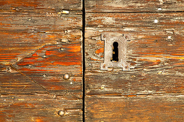 Image showing abstract  house  door     in italy  lombardy   red   closed  nai