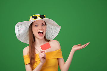 Image showing Summer girl ing blank credit card