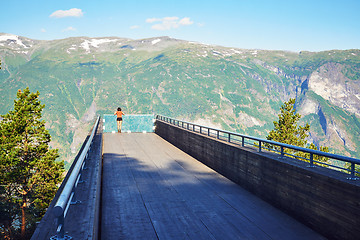 Image showing Woman enjoying scenics from Stegastein Viewpoint