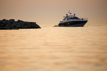 Image showing Boat with dinghy in Adriatic sea