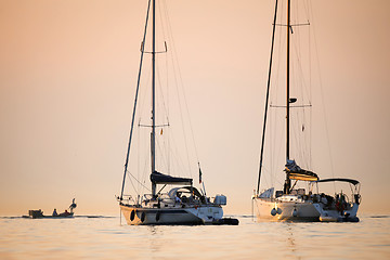 Image showing Boats sanchored at sunset