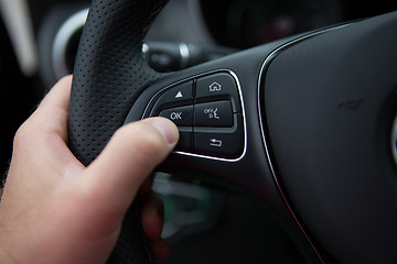 Image showing hand of a man driving  car