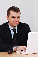 Image showing Businessman working on a lap-top