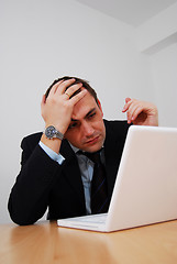 Image showing Businessman facing disaster