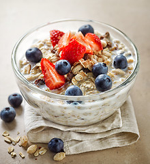 Image showing healthy breakfast, bowl of muesli with milk