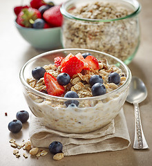 Image showing healthy breakfast, bowl of muesli with milk