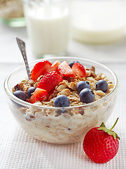 Image showing healthy breakfast, bowl of muesli with milk