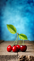 Image showing Cherries on wooden table