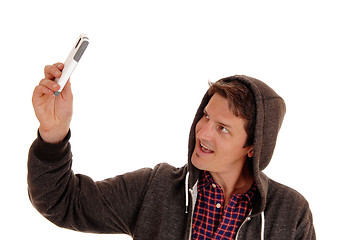 Image showing Man taking cell phone picture.