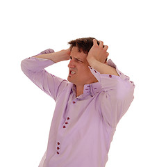 Image showing Man with heavy headache.