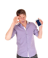 Image showing Man crying for broken phone.