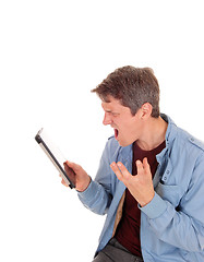 Image showing Man shouting on his tablet.