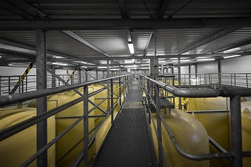 Image showing Industrial interior with welded silos