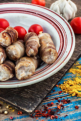 Image showing set fried meat sausages on wooden background