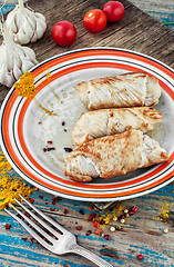 Image showing set fried meat sausages on wooden background