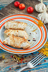 Image showing set fried meat sausages on wooden background