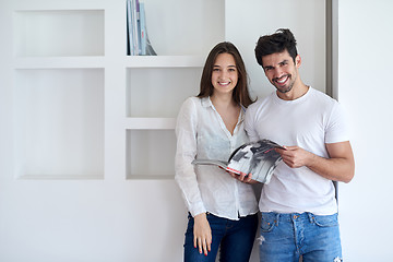 Image showing relaxed young couple at home staircase