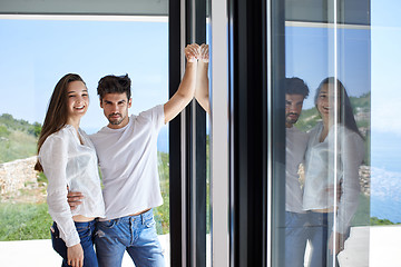 Image showing relaxed young couple at home staircase