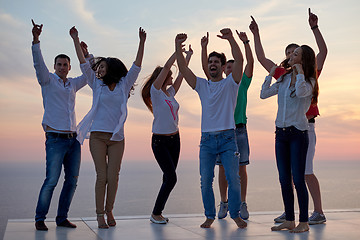 Image showing party people  on sunset