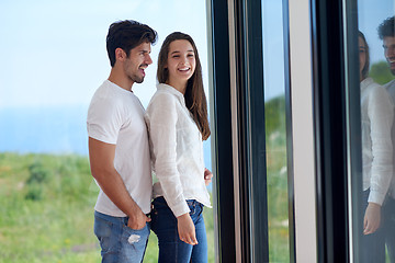 Image showing relaxed young couple at home staircase