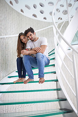 Image showing relaxed yung couple at home  stairs