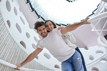 Image showing relaxed yung couple at home  stairs