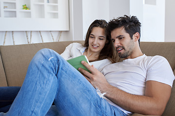 Image showing couple at modern home using tablet computer