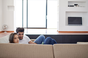 Image showing relaxed young couple at home staircase