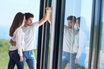 Image showing relaxed young couple at home staircase