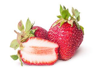 Image showing Two freshly whole and half strawberries