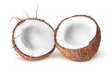 Image showing Two halves of coconut lying next