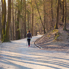 Image showing Woman hiking in nature. 