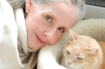 Image showing Female and cat.